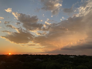 This beautiful hilltop home offers fantastic views of nearby on Apple Rock Golf Course - Horseshoe Bay in Texas - for sale on GolfHomes.com, golf home, golf lot