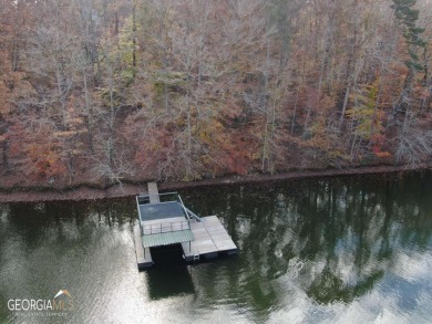 Come and see this rare 1 acre Lake Lanier Lake Front Lot with a on Chattahoochee Golf Course in Georgia - for sale on GolfHomes.com, golf home, golf lot
