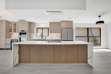 Exceptional 3 bedroom, 3 full bath residence is a private on  in Florida - for sale on GolfHomes.com, golf home, golf lot