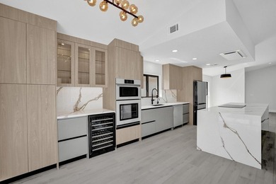 Exceptional 3 bedroom, 3 full bath residence is a private on  in Florida - for sale on GolfHomes.com, golf home, golf lot