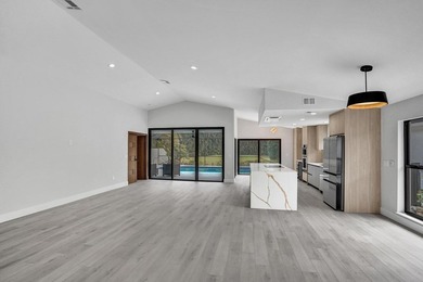 Exceptional 3 bedroom, 3 full bath residence is a private on  in Florida - for sale on GolfHomes.com, golf home, golf lot