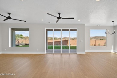 Experience breathtaking views of the city, mountains, and golf on Coral Canyon Golf Course in Utah - for sale on GolfHomes.com, golf home, golf lot