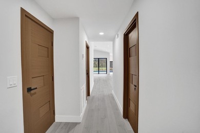 Exceptional 3 bedroom, 3 full bath residence is a private on  in Florida - for sale on GolfHomes.com, golf home, golf lot