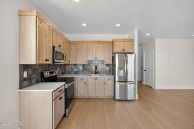 Experience breathtaking views of the city, mountains, and golf on Coral Canyon Golf Course in Utah - for sale on GolfHomes.com, golf home, golf lot