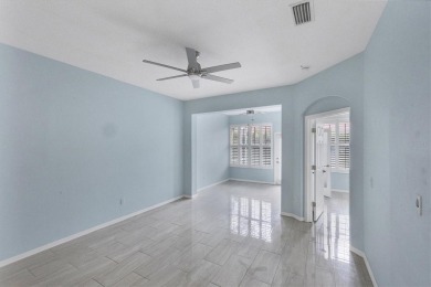 Come and See!  Updated villa has 2BD/2BA plus space for on Pelican Pointe Golf and Country Club in Florida - for sale on GolfHomes.com, golf home, golf lot