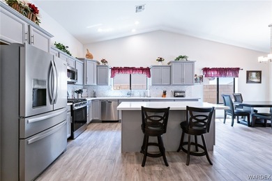 Welcome to this beautifully maintained 3-bedroom, 2-bath POOL on Desert Lakes Golf Course in Arizona - for sale on GolfHomes.com, golf home, golf lot