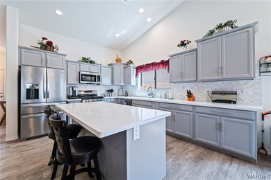 Welcome to this beautifully maintained 3-bedroom, 2-bath POOL on Desert Lakes Golf Course in Arizona - for sale on GolfHomes.com, golf home, golf lot