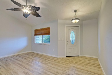 Welcome to this beautifully updated home featuring 3 bedrooms on Jacaranda West Country Club in Florida - for sale on GolfHomes.com, golf home, golf lot