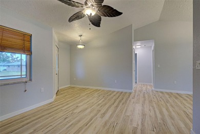 Welcome to this beautifully updated home featuring 3 bedrooms on Jacaranda West Country Club in Florida - for sale on GolfHomes.com, golf home, golf lot