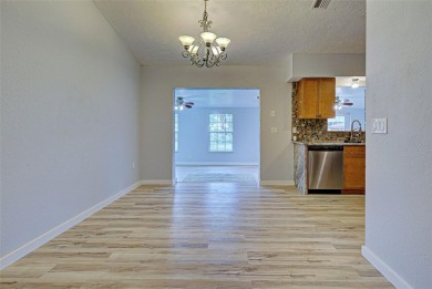 Welcome to this beautifully updated home featuring 3 bedrooms on Jacaranda West Country Club in Florida - for sale on GolfHomes.com, golf home, golf lot
