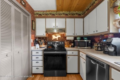 Welcome to this beautifully maintained 3-bedroom, 2-bath home on Oak Hills Country Club in Florida - for sale on GolfHomes.com, golf home, golf lot