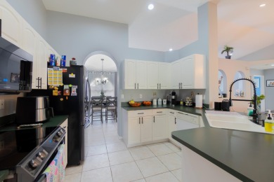 Come and experience this beautiful and peaceful waterview home on The Links At Madison Green in Florida - for sale on GolfHomes.com, golf home, golf lot