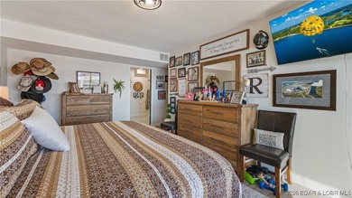 Beautifully updated waterfront condominium with stunning lake on Seasons Ridge At Four Seasons in Missouri - for sale on GolfHomes.com, golf home, golf lot