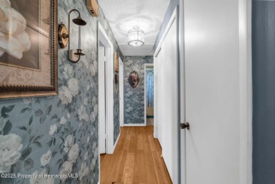 Welcome to this beautifully maintained 3-bedroom, 2-bath home on Oak Hills Country Club in Florida - for sale on GolfHomes.com, golf home, golf lot