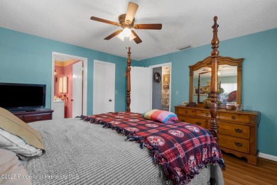 Welcome to this beautifully maintained 3-bedroom, 2-bath home on Oak Hills Country Club in Florida - for sale on GolfHomes.com, golf home, golf lot