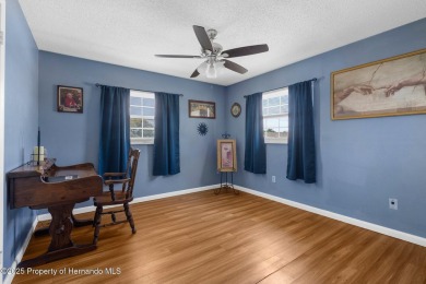 Welcome to this beautifully maintained 3-bedroom, 2-bath home on Oak Hills Country Club in Florida - for sale on GolfHomes.com, golf home, golf lot