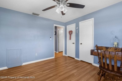 Welcome to this beautifully maintained 3-bedroom, 2-bath home on Oak Hills Country Club in Florida - for sale on GolfHomes.com, golf home, golf lot