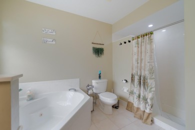 Come and experience this beautiful and peaceful waterview home on The Links At Madison Green in Florida - for sale on GolfHomes.com, golf home, golf lot