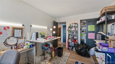 Beautifully updated waterfront condominium with stunning lake on Seasons Ridge At Four Seasons in Missouri - for sale on GolfHomes.com, golf home, golf lot