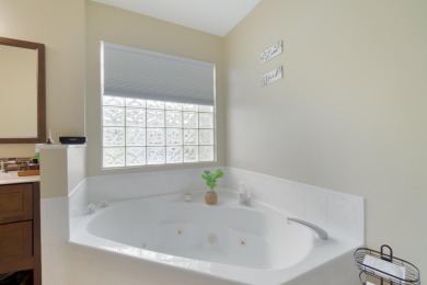 Come and experience this beautiful and peaceful waterview home on The Links At Madison Green in Florida - for sale on GolfHomes.com, golf home, golf lot