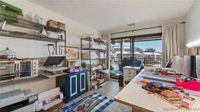 Beautifully updated waterfront condominium with stunning lake on Seasons Ridge At Four Seasons in Missouri - for sale on GolfHomes.com, golf home, golf lot