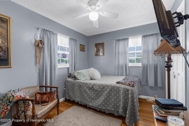 Welcome to this beautifully maintained 3-bedroom, 2-bath home on Oak Hills Country Club in Florida - for sale on GolfHomes.com, golf home, golf lot