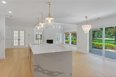 Coastal elegance meets breathtaking golf views in this stunning on Dolphin Head Golf Club in South Carolina - for sale on GolfHomes.com, golf home, golf lot