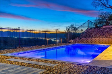 Experience elevated desert luxury in the prestigious Laughlin on Laughlin Ranch Golf Club in Arizona - for sale on GolfHomes.com, golf home, golf lot