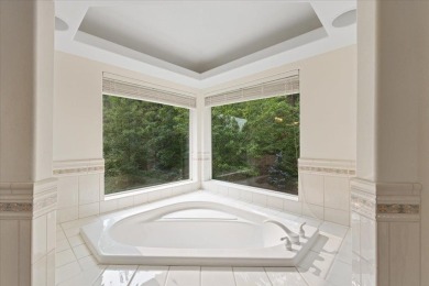 Discover this Spectacular Home Show Award Winner in the serene on Hangman Valley Golf Course in Washington - for sale on GolfHomes.com, golf home, golf lot