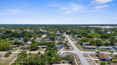 Welcome to this beautifully maintained 3-bedroom, 2-bath home on Oak Hills Country Club in Florida - for sale on GolfHomes.com, golf home, golf lot