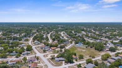 Welcome to this beautifully maintained 3-bedroom, 2-bath home on Oak Hills Country Club in Florida - for sale on GolfHomes.com, golf home, golf lot