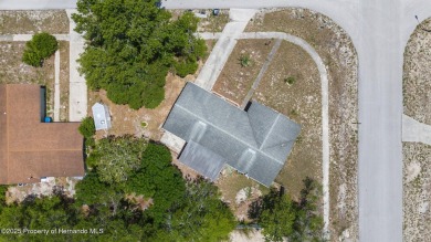 Welcome to this beautifully maintained 3-bedroom, 2-bath home on Oak Hills Country Club in Florida - for sale on GolfHomes.com, golf home, golf lot