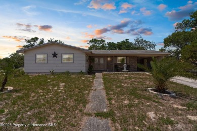 Welcome to this beautifully maintained 3-bedroom, 2-bath home on Oak Hills Country Club in Florida - for sale on GolfHomes.com, golf home, golf lot