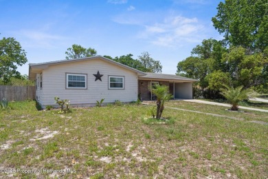 Welcome to this beautifully maintained 3-bedroom, 2-bath home on Oak Hills Country Club in Florida - for sale on GolfHomes.com, golf home, golf lot
