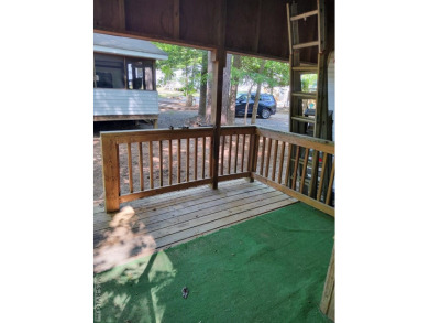 Nice size lot with parking area. 1995 Camper has stick built on River Ridge Golf Club in Virginia - for sale on GolfHomes.com, golf home, golf lot