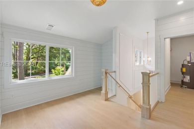Coastal elegance meets breathtaking golf views in this stunning on Dolphin Head Golf Club in South Carolina - for sale on GolfHomes.com, golf home, golf lot