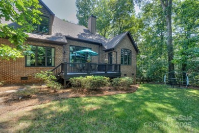 Welcome to this stunning all-brick custom home w/ stacked stone on Cowans Ford Country Club in North Carolina - for sale on GolfHomes.com, golf home, golf lot