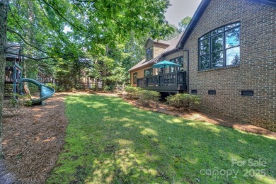 Welcome to this stunning all-brick custom home w/ stacked stone on Cowans Ford Country Club in North Carolina - for sale on GolfHomes.com, golf home, golf lot