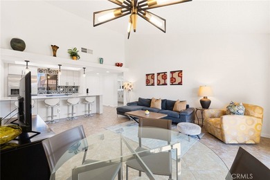 Welcome to 77247 Olympic Way, an exceptional lakefront retreat on Palm Desert Resort Country Club in California - for sale on GolfHomes.com, golf home, golf lot