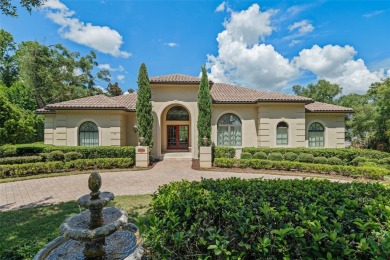 Nestled within the gates of the renowned Isleworth Golf  Country on Isleworth Golf and Country Club in Florida - for sale on GolfHomes.com, golf home, golf lot