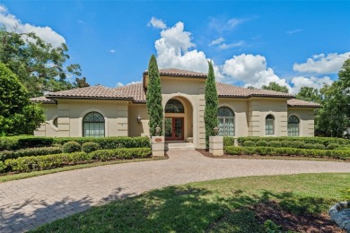 Nestled within the gates of the renowned Isleworth Golf  Country on Isleworth Golf and Country Club in Florida - for sale on GolfHomes.com, golf home, golf lot