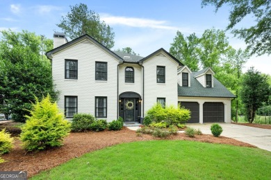 Updated 4-bedroom, 2 and a half bathroom home situated on on Braelinn Golf Club in Georgia - for sale on GolfHomes.com, golf home, golf lot