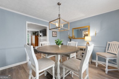 Updated 4-bedroom, 2 and a half bathroom home situated on on Braelinn Golf Club in Georgia - for sale on GolfHomes.com, golf home, golf lot