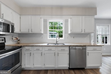 Updated 4-bedroom, 2 and a half bathroom home situated on on Braelinn Golf Club in Georgia - for sale on GolfHomes.com, golf home, golf lot