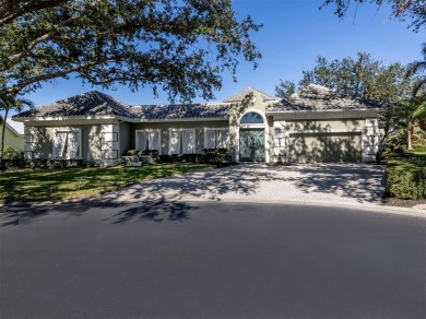 Timeless and traditional custom built Arthur Rutenberg courtyard on Plantation Golf and Country Club in Florida - for sale on GolfHomes.com, golf home, golf lot