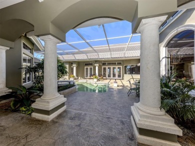 Timeless and traditional custom built Arthur Rutenberg courtyard on Plantation Golf and Country Club in Florida - for sale on GolfHomes.com, golf home, golf lot