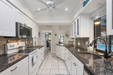 This beautifully maintained 3-bedroom, 2-bathroom pool home on Rotonda Golf and Country Club The Palms Course in Florida - for sale on GolfHomes.com, golf home, golf lot