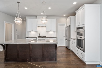 Gorgeous end-unit villa offering privacy and nature in a quiet on Old Trail Golf Club in Virginia - for sale on GolfHomes.com, golf home, golf lot