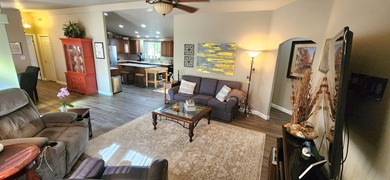 Presenting this well-maintained 3-bedroom, 2-bath home built in on Palm Desert Greens Country Club in California - for sale on GolfHomes.com, golf home, golf lot