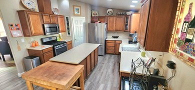 Presenting this well-maintained 3-bedroom, 2-bath home built in on Palm Desert Greens Country Club in California - for sale on GolfHomes.com, golf home, golf lot